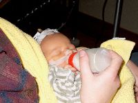 December 20, 2002 - Learning to drink, very difficult